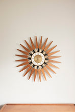 Vintage Starburst clock By Elgin with rare gold and black inlay accents