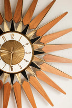 Vintage Starburst clock By Elgin with rare gold and black inlay accents