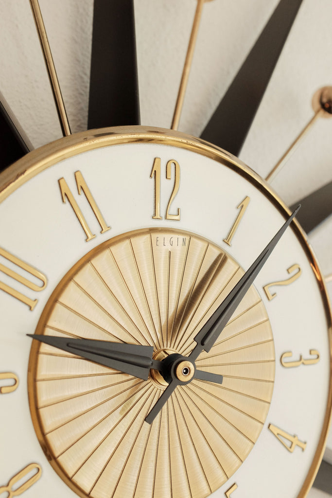 Vintage Mid Century Elgin Starburst Clock Black metal and Brass