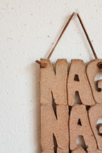 Nag ceramic wall hanging