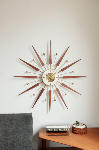 Vintage Mid Century Welby Starburst Clock - Wood / Brass accented starbursts, brass / white clock face. Wind up